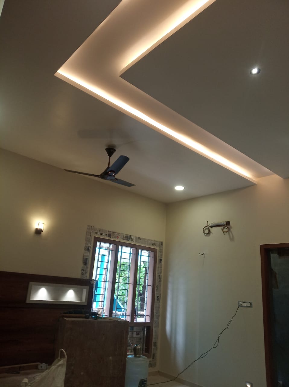 False ceiling interior work with cove lighting in Trichy house